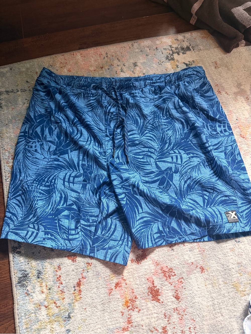 ZeroXposur Blue Palm-Print Swim Trunks